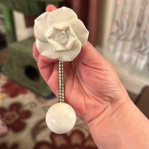 Anthropologie rose wall hook.